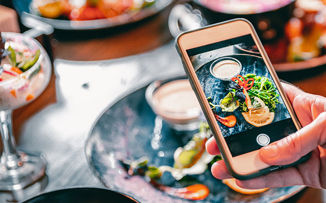 Phone photographing meal - Food & Beverage Trends